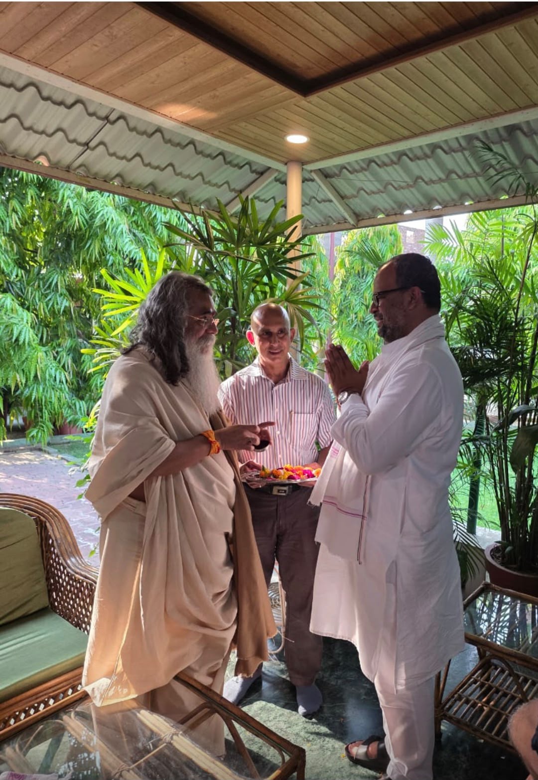 Maharishi Yogi Madhusudan Ji blessing a visitor