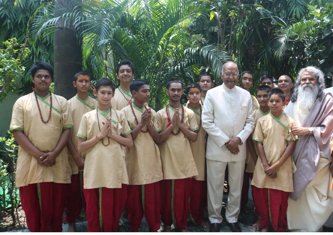 Disciples with their Guru at the ashram